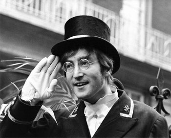 John Winston Lennon in tophat and gloves