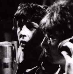 Paul McCartney and John Lennon singing together