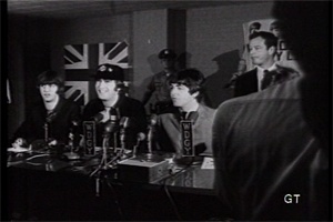 Brian Epstein at a Beatles press conference