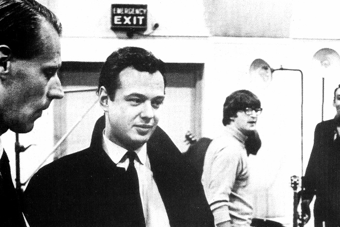 Brian Epstein with George Martin and the Beatles
