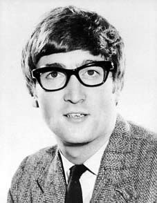 John Lennon wearing some geeky Peter Sellers type glasses