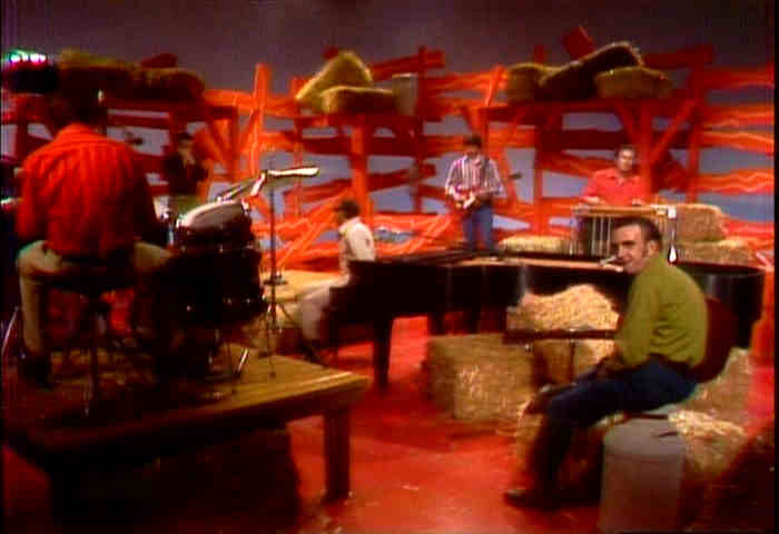 Ray Charles checks on the band