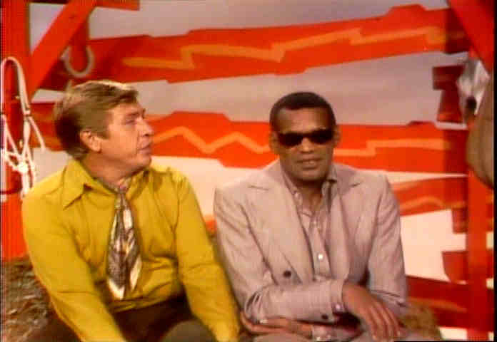 Buck Ownes joking with Ray Charles on Hee Haw