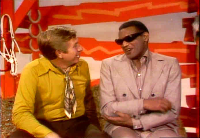 Buck Owens asks Ray Charles about his necktie