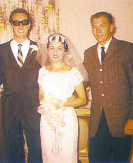 Charles Hardin Holley, his bride Maria Elena Holley, and JJ Allison