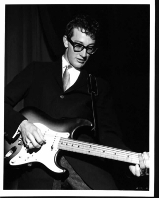 Buddy Holly playing guitar