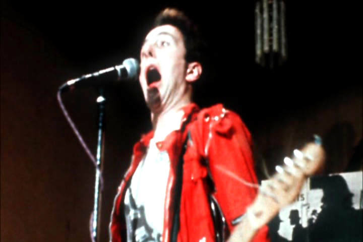 Joe Strummer of The Clash on the mic, 1977