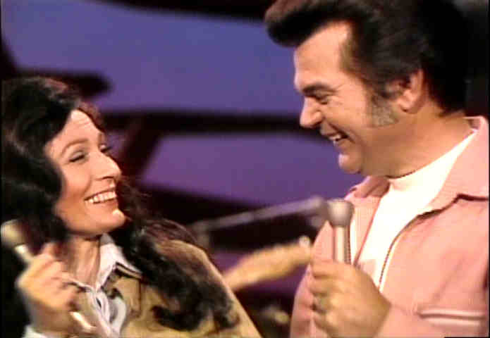 Loretta Lynn and Conway Twitty laughing