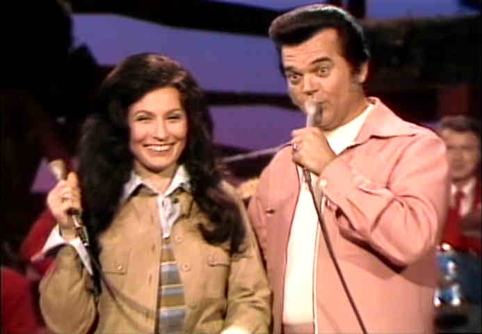 Loretta Lynn and Conway Twitty are all smiles