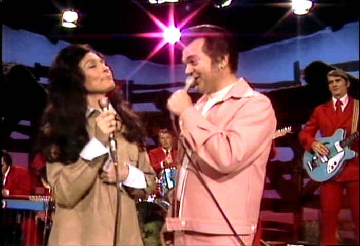 Loretta Lynn and Conway Twitty on stage