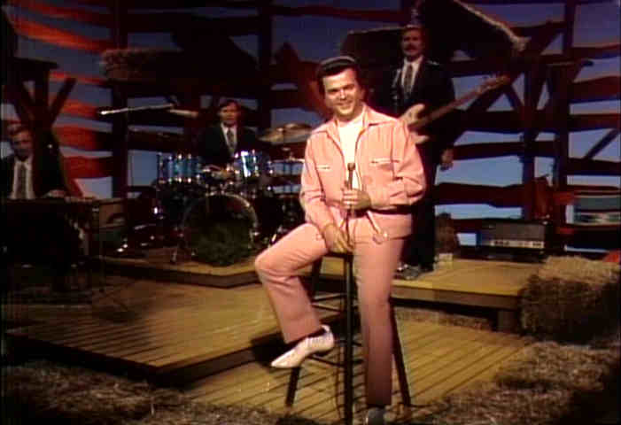 smiling Conway Twitty image
