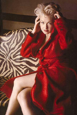 Cyndi Lauper in a red dress