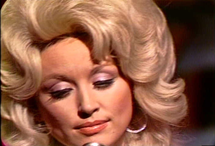 contemplative Dolly Parton