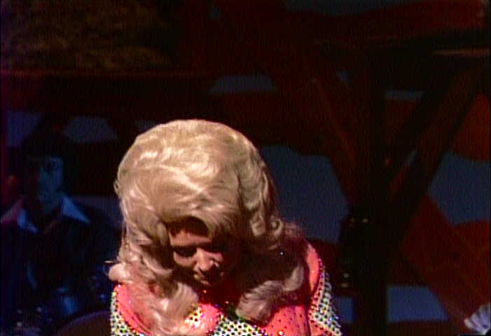 Dolly Parton taking a bow