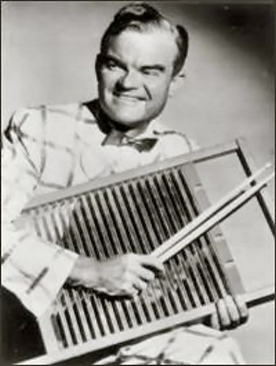 Lindley Armstrong "Spike" Jones playing a washboard