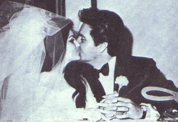Elvis Presley kisses the bride
