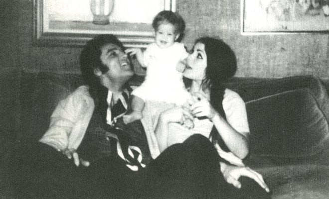 casual black and white Elvis Presley family photo
