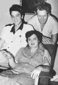 Elvis Presley with mom and dad