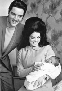Elvis and Priscilla Presley, with newborn Lisa Marie