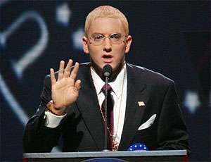 Marshall Mathers in jacket and tie