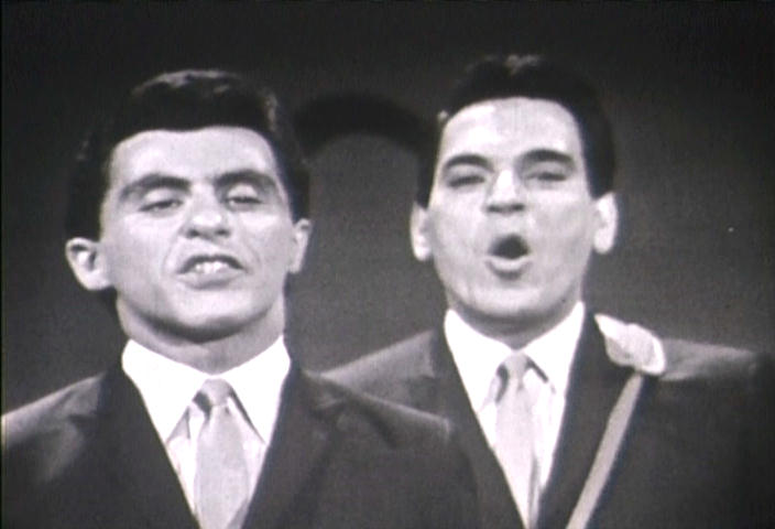 Frankie Valli and Nick Massi singing