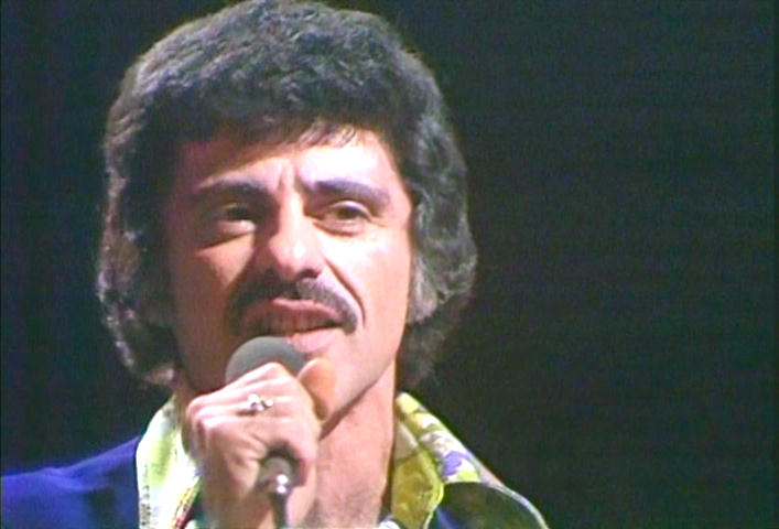 closeup of Frankie Valli with a moustache