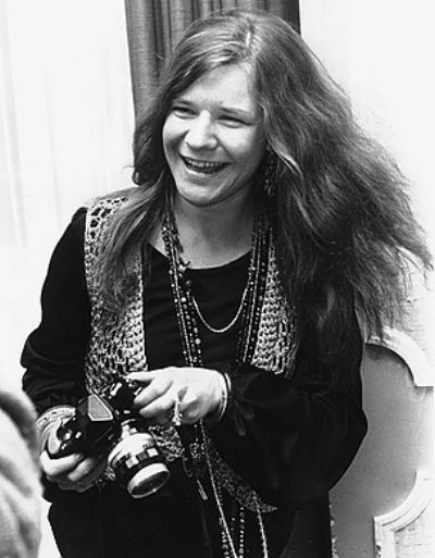 laughing photographer Janis Joplin