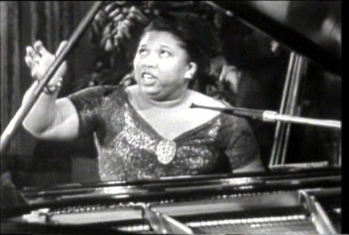 Martha Davis playing piano