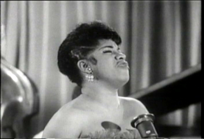 Ruth Brown throws her head back