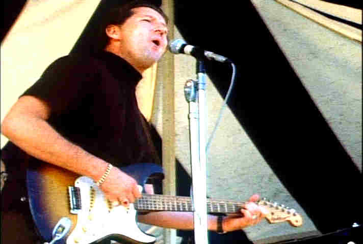 Jerry Lee Lewis playing guitar on stage 1969