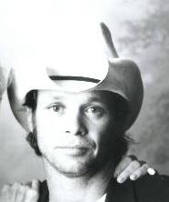 John Mellencamp wearing a cowboy hat