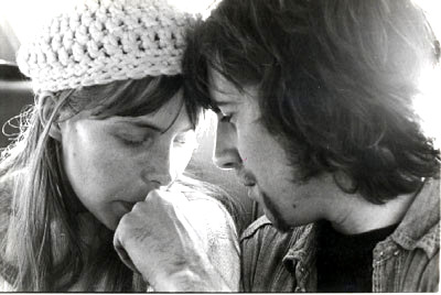 a tender moment between Joni Mitchell and Graham Nash