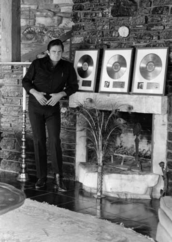 Johnny Cash and a few of his gold records