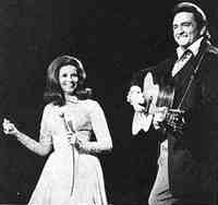 swinging young June Carter and Johnny Cash