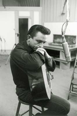 contemplative Johnny Cash in the studio