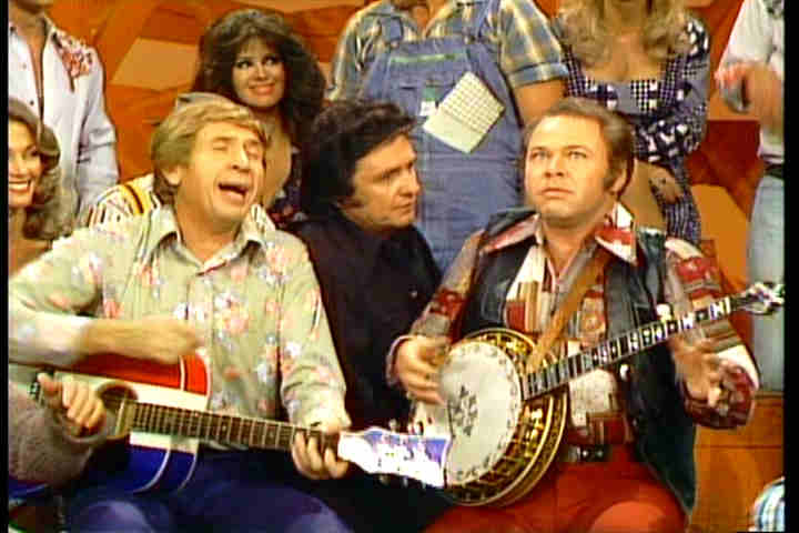 Buck Owens laughs