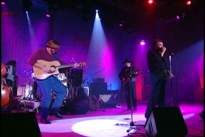 Johnny Cash jamming on stage with John Jr, 1994