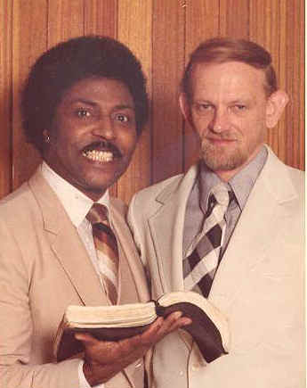 preacher Tim Duffy and Little Richard Penniman with a Bible