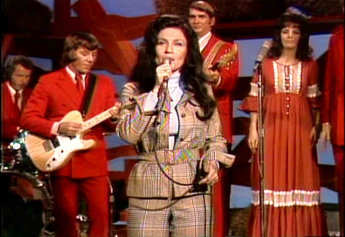 Loretta Lynn in a pants suit