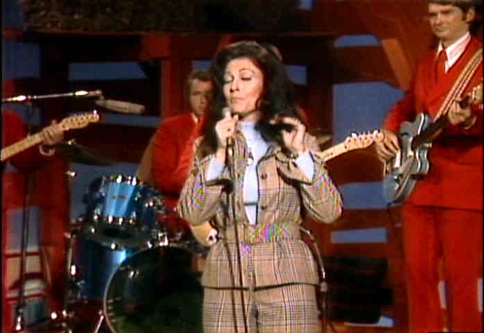 Loretta Lynn mocking a foolish husband with a song Shel Silverstein custom wrote for her, "Hey Loretta"