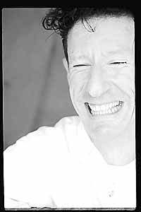 smiling black and white Lyle Lovett photo