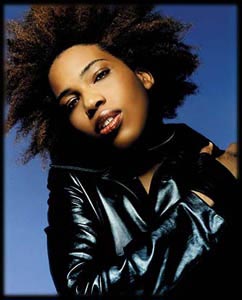 Macy Gray in a leather jacket