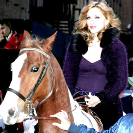 Madonna riding a horse