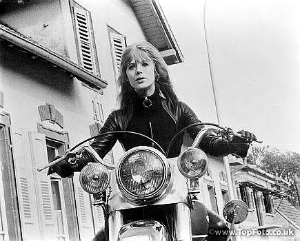 hot young thing Marianne Faithfull on a motorcycle