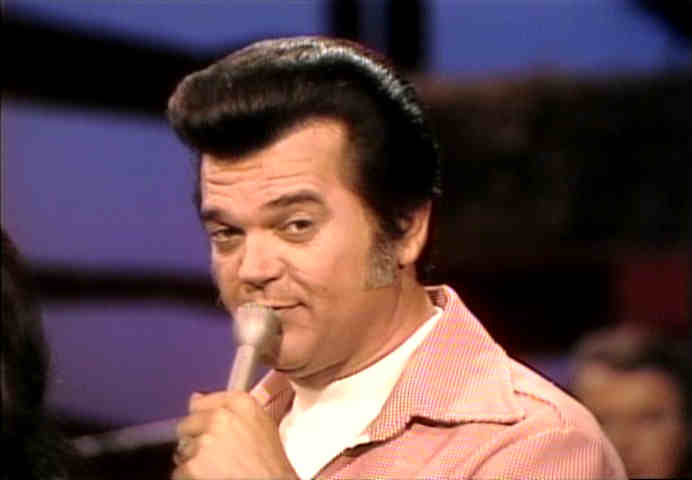 Conway Twitty works them eyebrows