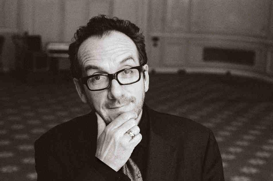 Elvis Costello rubs his chinny-chin-chin