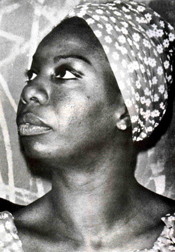 Nina Simone and one of her many head dresses
