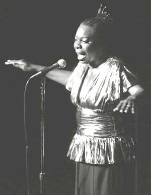 Nina Simone singing on stage