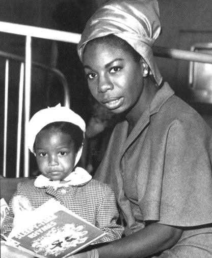 Nina Simone reading to a child