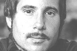 Paul Simon with a moustache